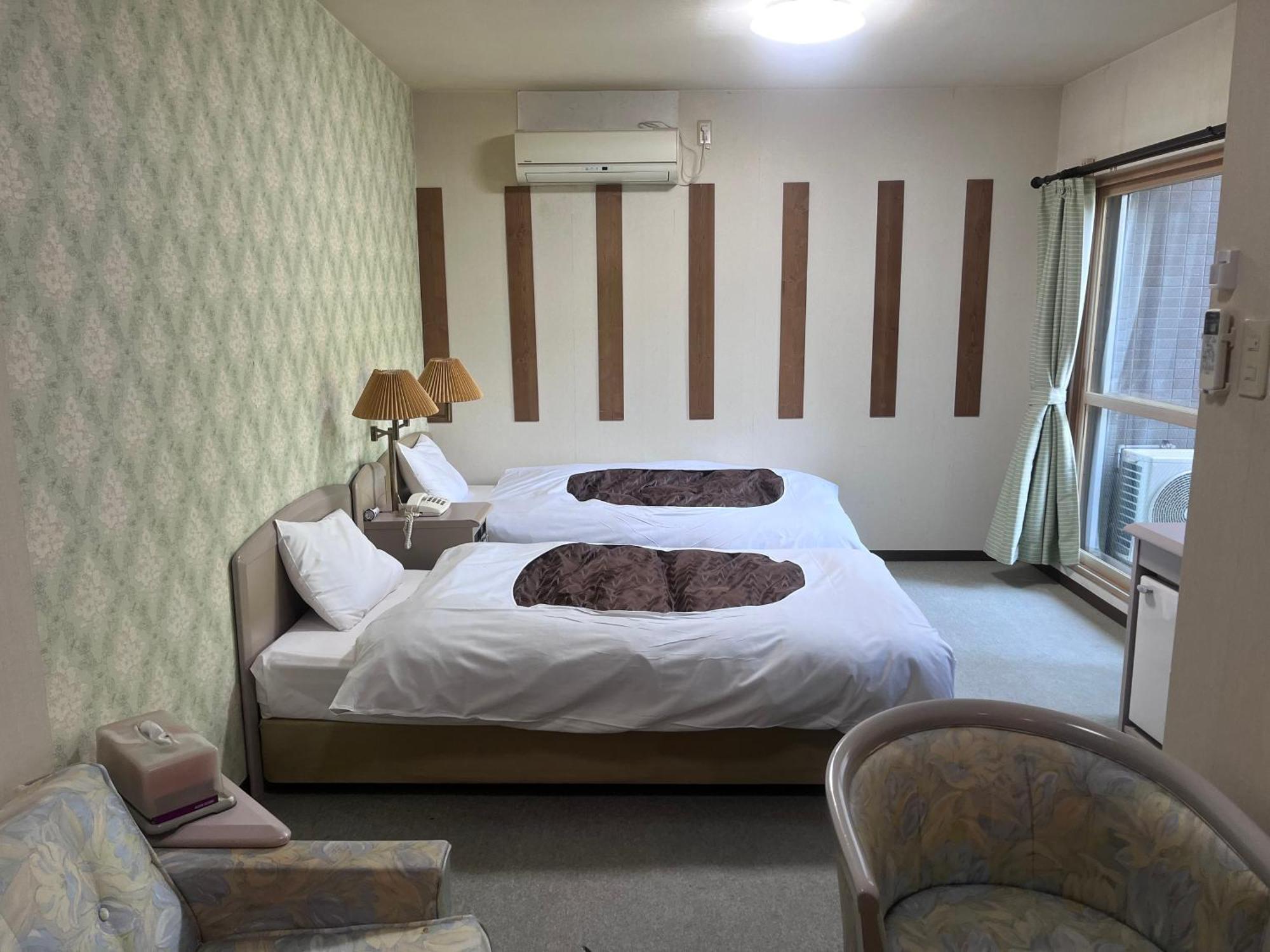 フューデイズコンドミニアム定山渓201号室 Apartamento Sapporo Quarto foto